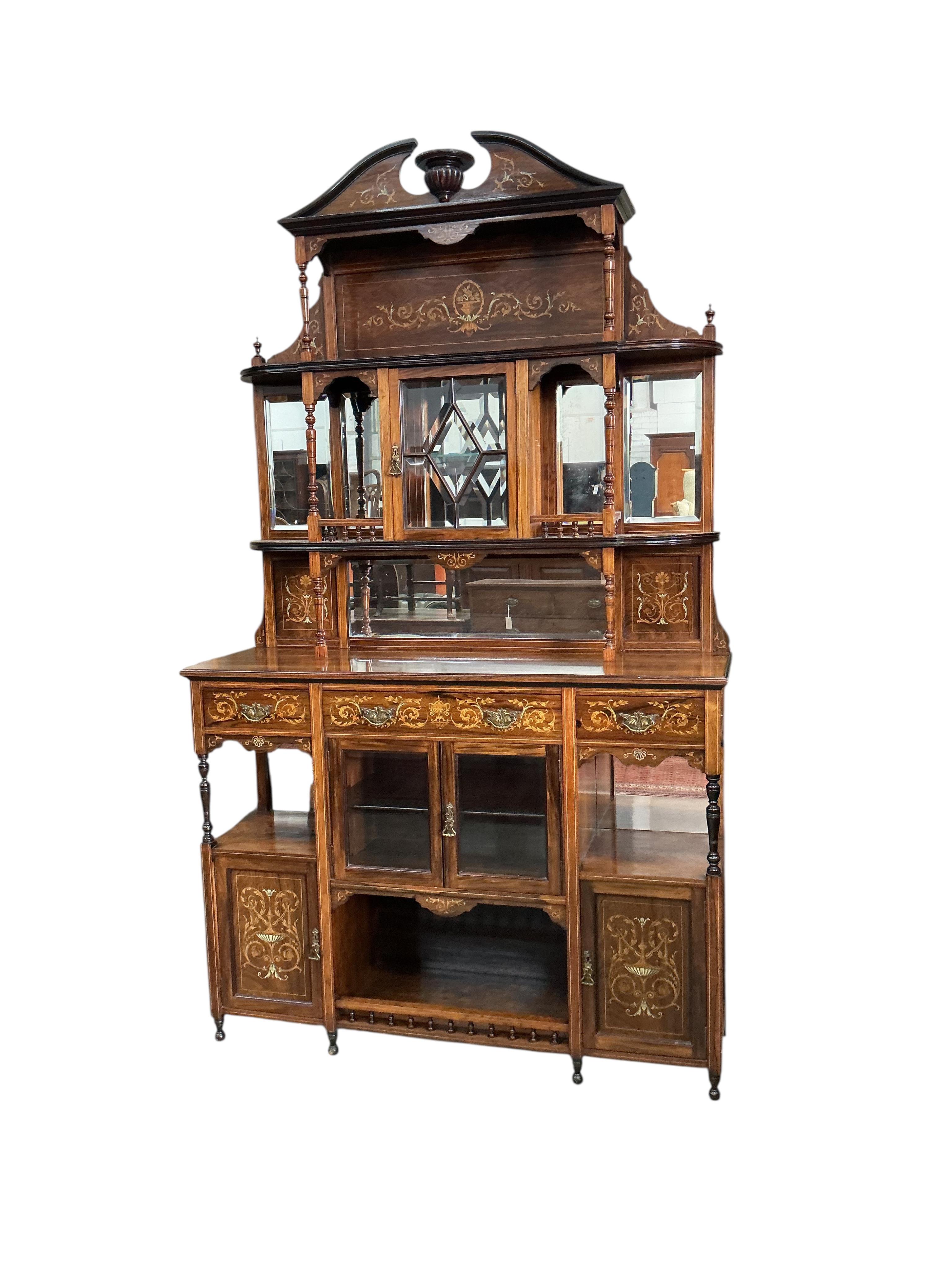 A late Victorian marquetry inlaid rosewood side cabinet, width 138cm, depth 42cm, height 228cm